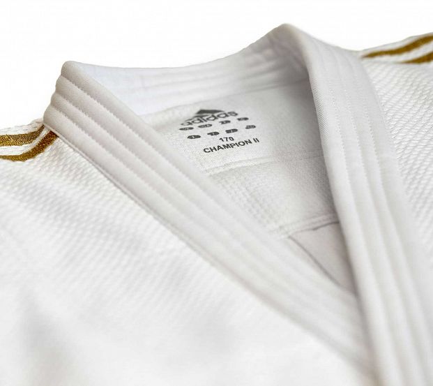 Кимоно для дзюдо Champion 2 IJF Premium белое с золотыми полосками фото 12